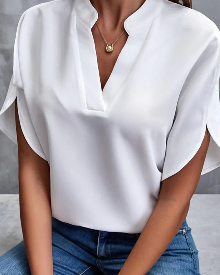 Damen Sommerbluse mit lockerem Schnitt und Kurzarm, ideal für entspannte Tage und Freizeit.