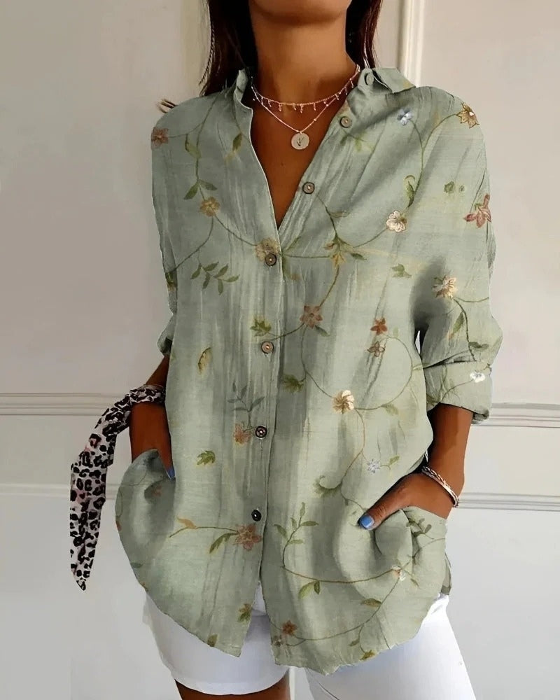 Vielseitige Damenbluse mit modernem Print und durchgehender Knopfleiste, sehr bequem.