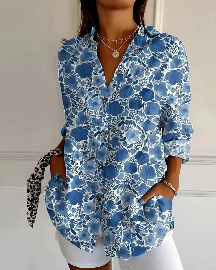 Damen Bluse mit floralem Print, Knopfleiste und Langarm, luftig und modisch.
