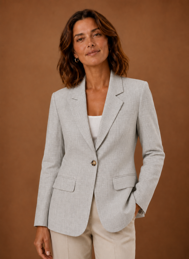 Eleganter Damen Business Blazer in Grau mit modernem Einknopf-Verschluss und tailliertem Schnitt für Büro & Abend.