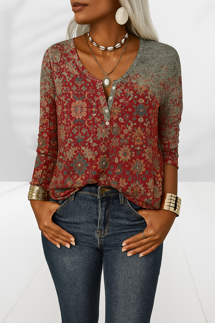 Damen Bluse im floralen Boho-Stil mit lockerer Passform, V-Ausschnitt und langen Ärmeln. Bequeme Sommermode.