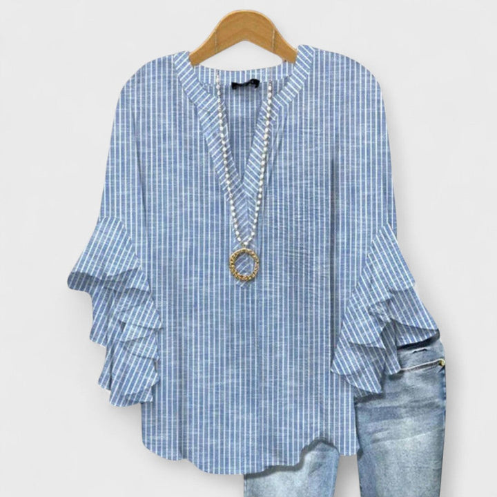 Modische Sommerbluse für Damen. Bequemer V-Ausschnitt & fließende Volantärmel. Ideal für Freizeit.