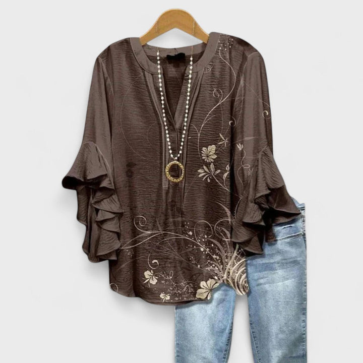 Elegante Bürobluse für Damen. Stilvoller V-Ausschnitt & feminine Volantärmel. Vielseitig kombinierbar.