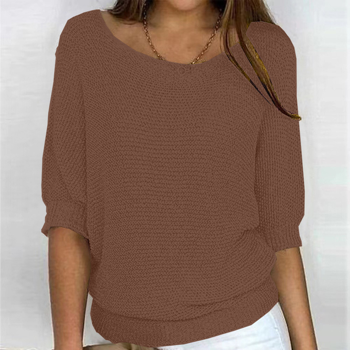 Stilvoller Damen Pullover mit Kreuzmuster. Eleganter Langarm-Strick für lässige Anlässe oder moderne Herbst-Outfits.