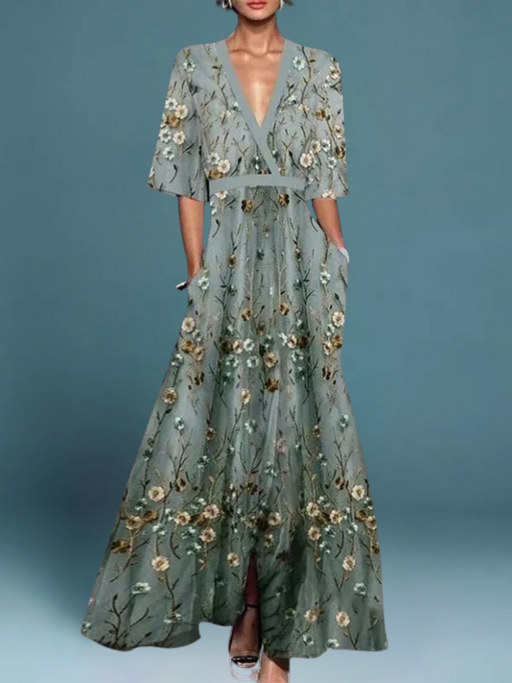 Elegantes Damen Blumenkleid, perfekt für festliche Anlässe. Bequem und stilvoll mit floralem Muster.