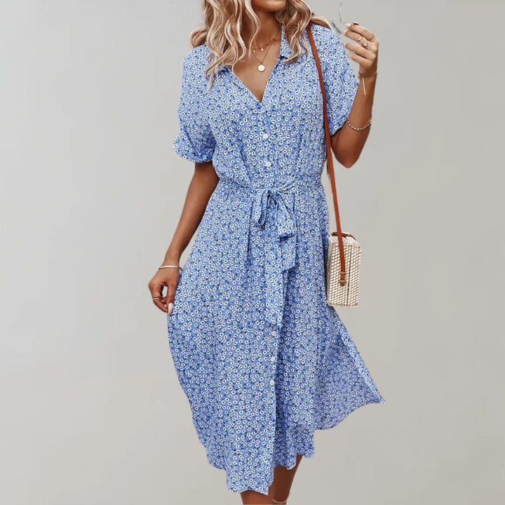 Komfortables frühlingshaftes Midi-Damenkleid mit lockerer Passform und kurzen Ärmeln, ideal für warme Tage.