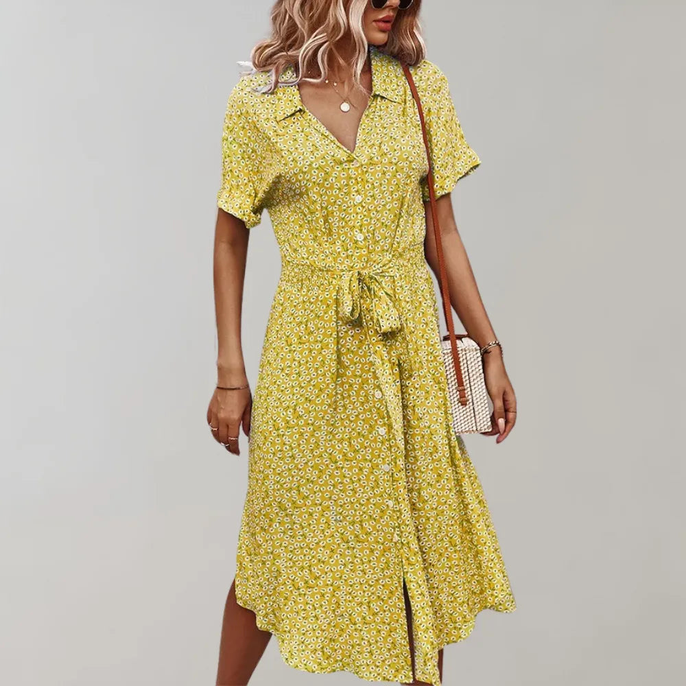 Schickes Frühlings-Midi-Kleid mit kurzen Ärmeln, aus leichtem, fließendem Stoff für maximalen Komfort.