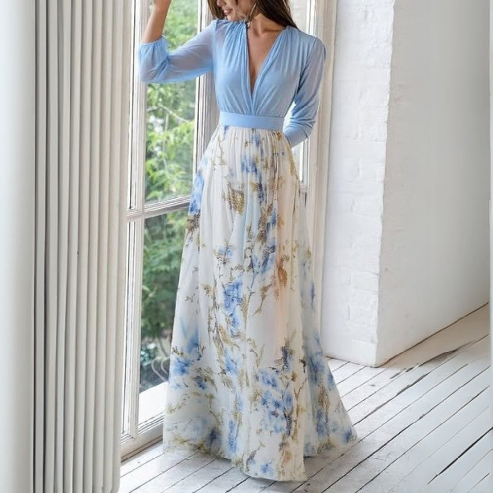 Langes Damenkleid mit vibrantem Blumenmuster. Ideal für Freizeit oder elegante Anlässe im Sommer.