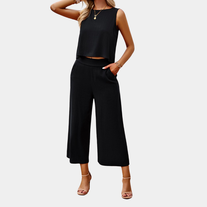 Stylisches Damen Sommer Set: Kurzarm Top und fließende Hose. Perfekt für Freizeit und warme Tage.