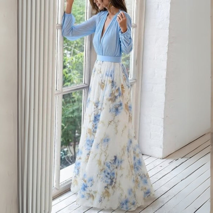 Modisches Damen Maxikleid mit Blumenprint. Ein fließendes Freizeitkleid, auch elegant für Sommerpartys.
