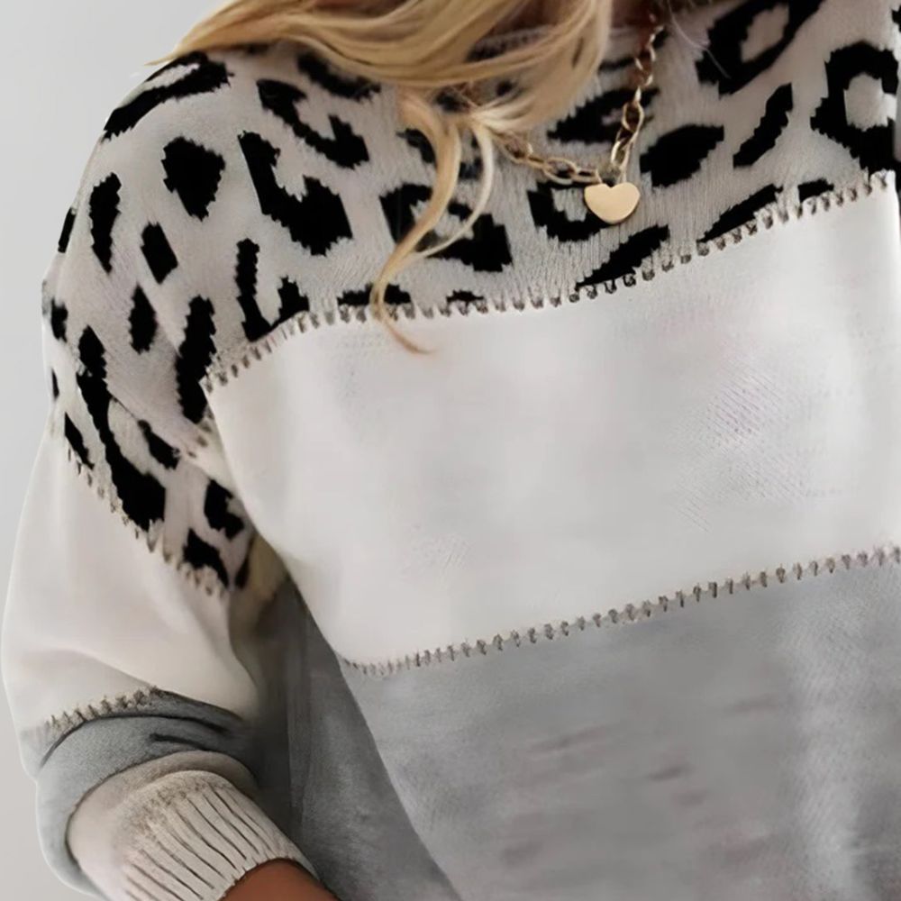 Hochwertiger Damen-Pullover mit Leopardenprint, warm und schick für die kalte Jahreszeit.
