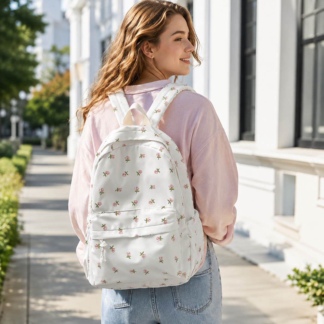 Damen Schulrucksack mit Blumenmuster in Weiß-Rosa, leicht & organisiert. Ideal für Schule, Uni und Alltag.