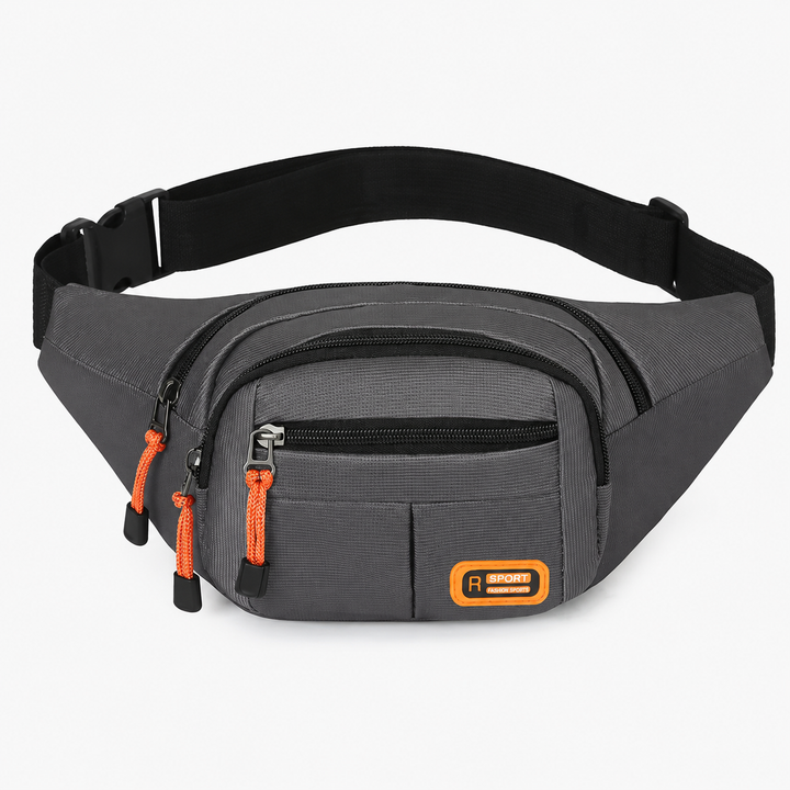 Mann trägt die wasserdichte Unisex Hüfttasche quer über die Brust, stilvoll und praktisch für Outdoor.