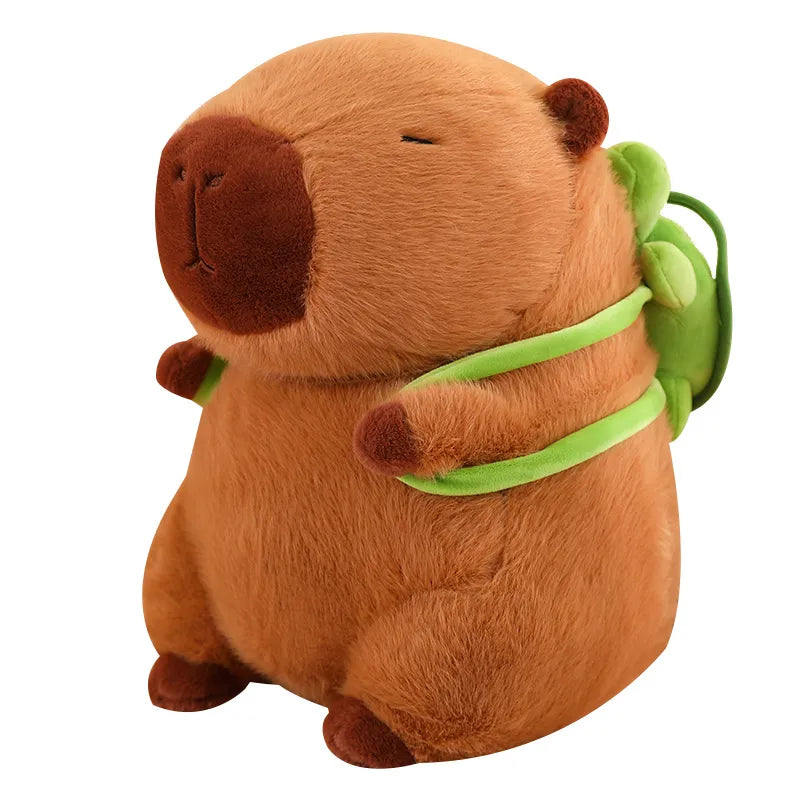 Niedliches, weiches Capybara Kuscheltier mit Schildkrötenrucksack. Braunes Plüschtier, ideales Geschenk für Kinder & Tierfreunde.