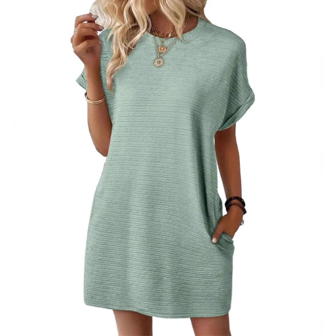 Casual Damen T-Shirtkleid mit lockerer Passform. Ideales Sommerkleid mit Rundhals & praktischen Taschen.