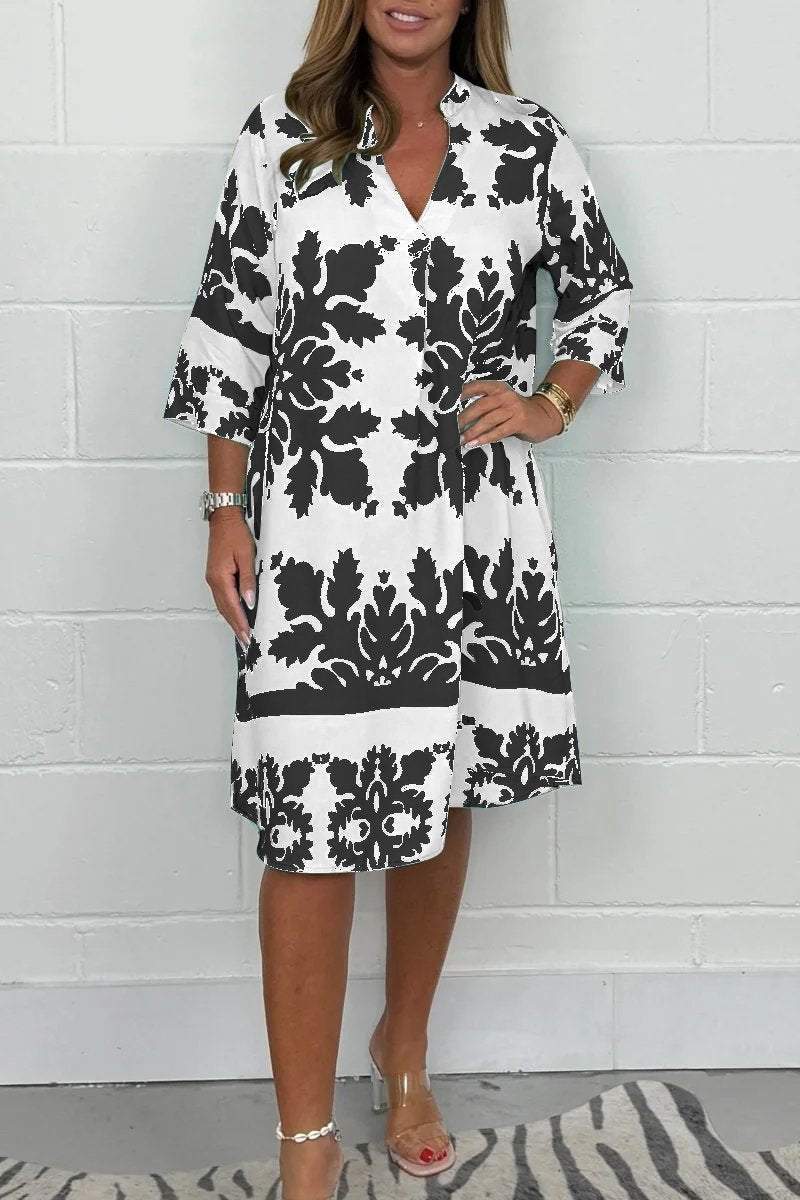 Modernes Freizeitkleid für Damen: Frühlings- und Sommerkleid mit V-Ausschnitt, Mustern & lockerer Passform.