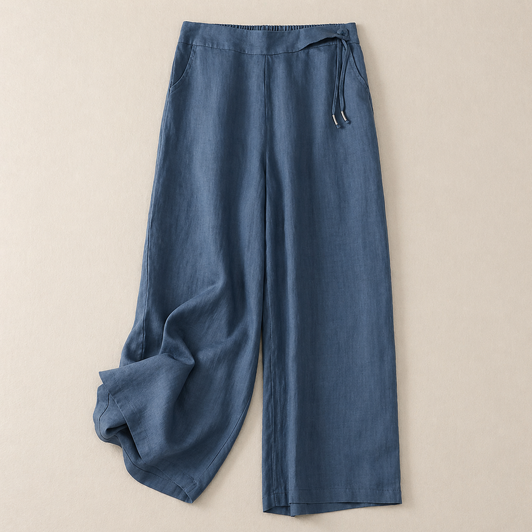 Trendige weite Hose für Damen mit Kordelzug. Lässige Passform, perfekt als leichte Reisehose oder schicke Sommerhose.
