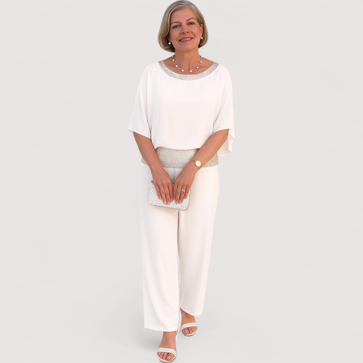 Modernes, elegantes Damen Zweiteiler Set. Bestehend aus Top mit Fledermausärmeln & lockerer Hose für stilvolle Outfits.