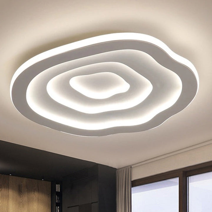 Minimalistische Acryl LED-Deckenlampe mit flexibler Farbtemperatur. Ideal für stilvolles Wohnzimmer-Ambiente.