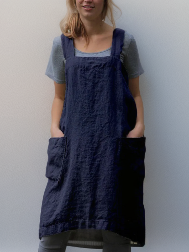 Elegante melierte Damen Pinafore Schürze mit Kreuzträgern; moderne Latzschürze für Freizeit und Arbeit.