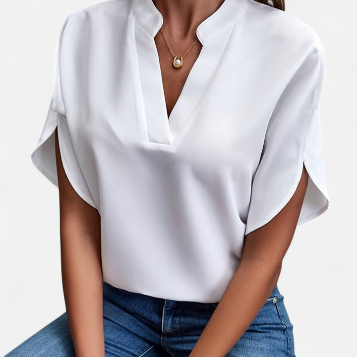 Stilvolle Damenbluse mit weiten Ärmeln & tailliertem Schnitt. Ideal als Büro- oder Freizeitbluse.
