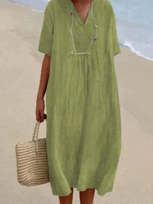 Elegantes Damen Midi-Sommerkleid mit V-Ausschnitt & lockerer Passform. Perfekt als Strand- oder Freizeitkleid.