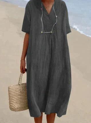 Modernes Damen Sommerkleid mit V-Ausschnitt & Kurzarm. Lockeres Midi-Kleid, perfekt für Freizeit, Strand und Urlaub.