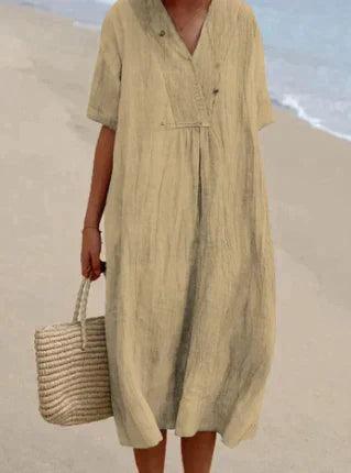 Stilvolles Damen V-Ausschnitt Sommerkleid mit Kurzarm. Elegantes Freizeitkleid mit lockerer Passform für warme Tage.