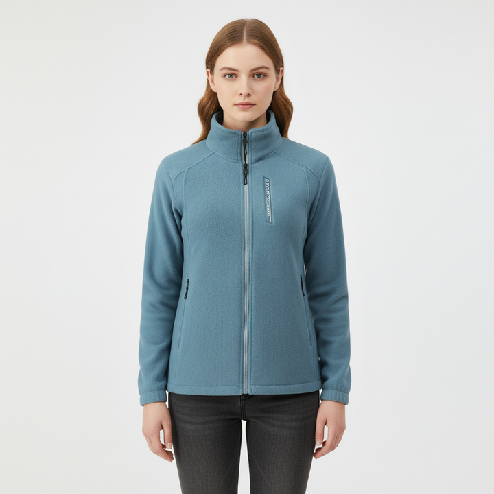 Vielseitige Damen Fleecejacke Ingrid für Damen. Warme Übergangsjacke mit Stehkragen. Ideal für Herbst & milde Wintertage.
