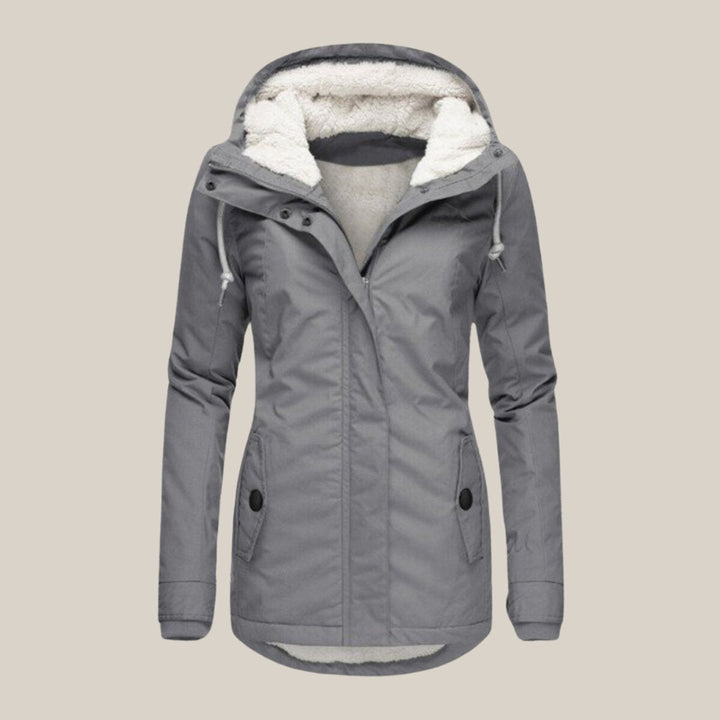 Funktionale Damen Winterjacke, winddicht und warm, mit Kapuze für kalte Outdoor-Tage.