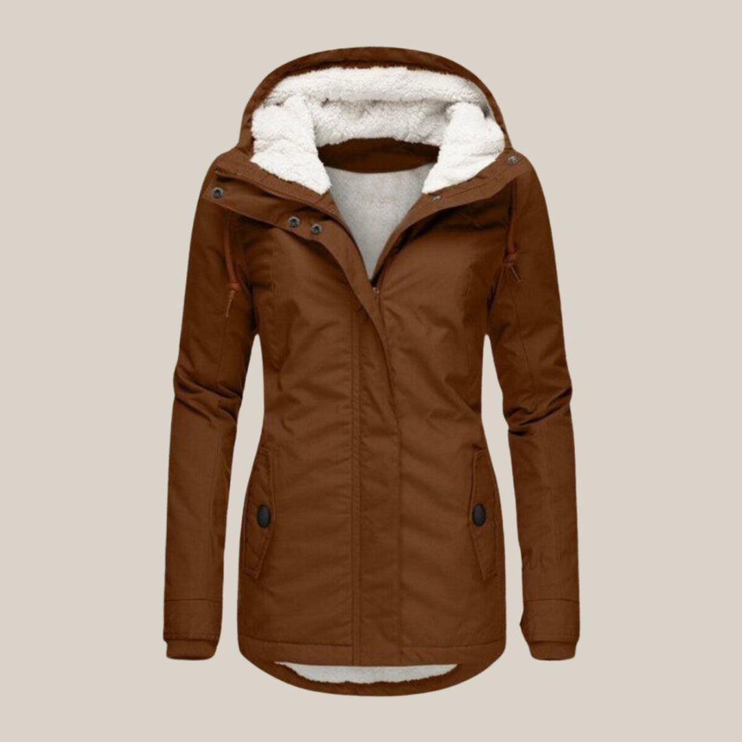 Gesteppte Damenjacke mit Kapuze, bietet Wärme und Komfort für den Winter und Freizeit.