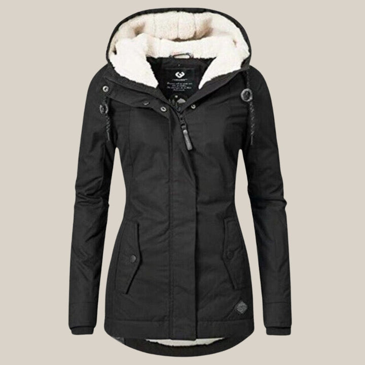 Vielseitige Damen Steppjacke mit Kapuze, warm und elegant, für Alltag, Outdoor und kalte Tage.