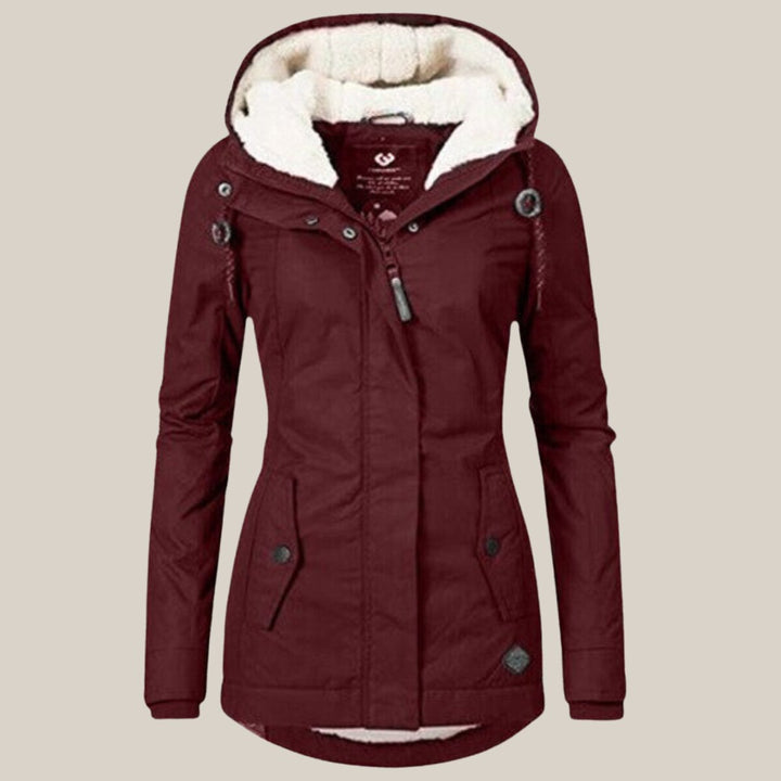 Trendige Damen Steppjacke mit Kapuze, warme Winterjacke für elegante Outdoor-Looks.