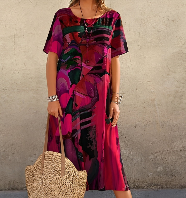 Stilvolles Damen Kurzarm-Midikleid mit lockerem Schnitt und einzigartigem Statement-Print; ideal für Freizeit.