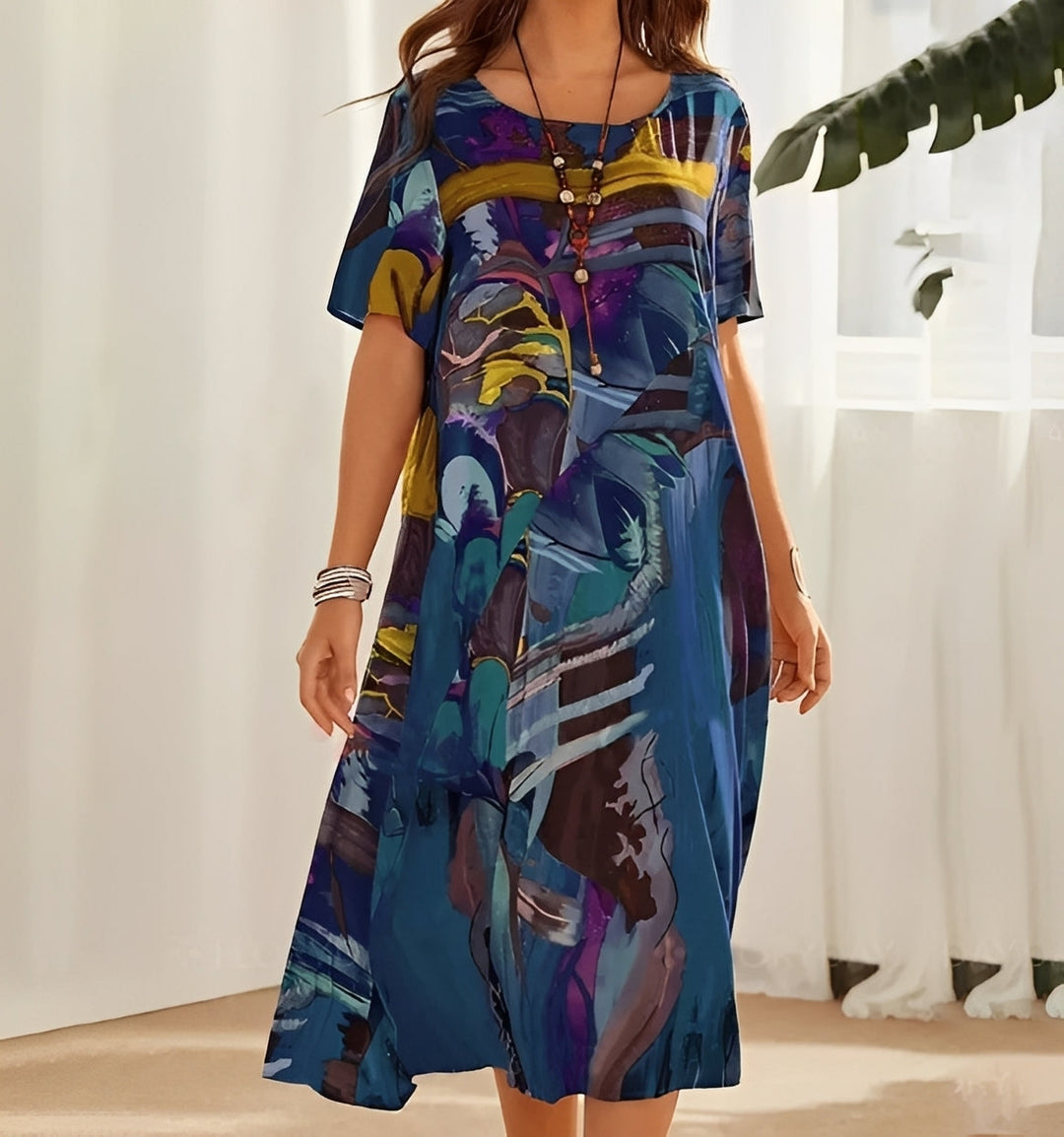 Entspanntes Damen Sommerkleid mit lockerem Schnitt, Statement-Print und kurzen Ärmeln für modischen Komfort.