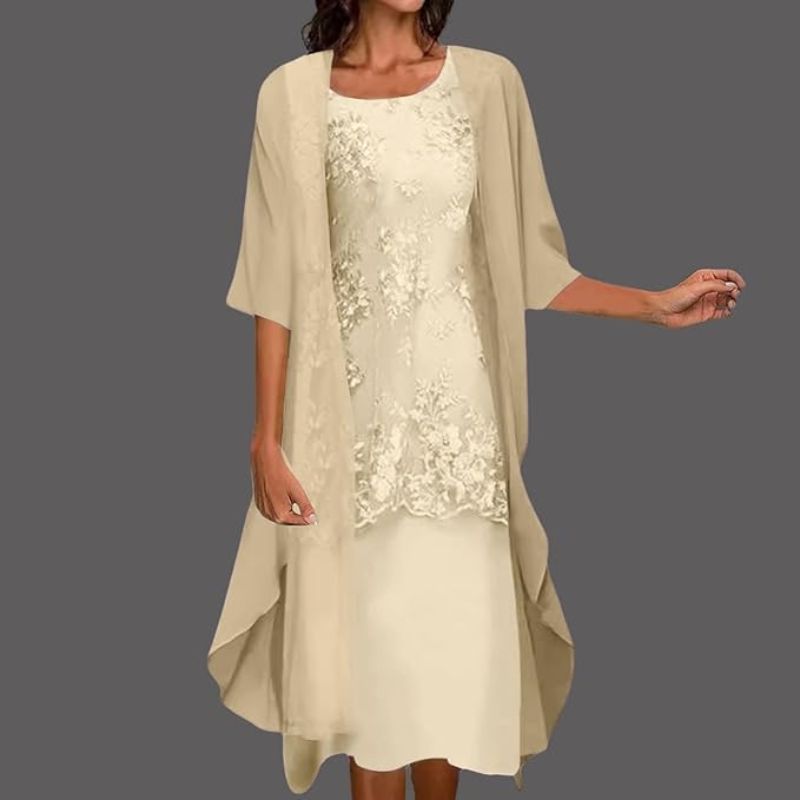 Schmeichelhaftes Damen Relaxed Fit Midikleid mit Spitzen-Details und Cape, perfekt als elegantes Sommer- oder Festkleid.