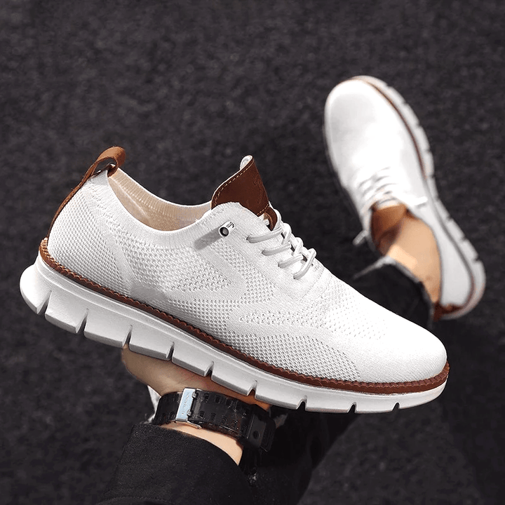 Atmungsaktive Herren Sneaker in Grau, mit robustem Obermaterial und komfortabler Sohle für lange Tage.
