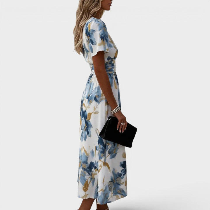 Schickes Sommer-Abendkleid für Damen: Wickel-Midikleid mit farbenfrohem Blumenprint, ideal für besondere Anlässe.