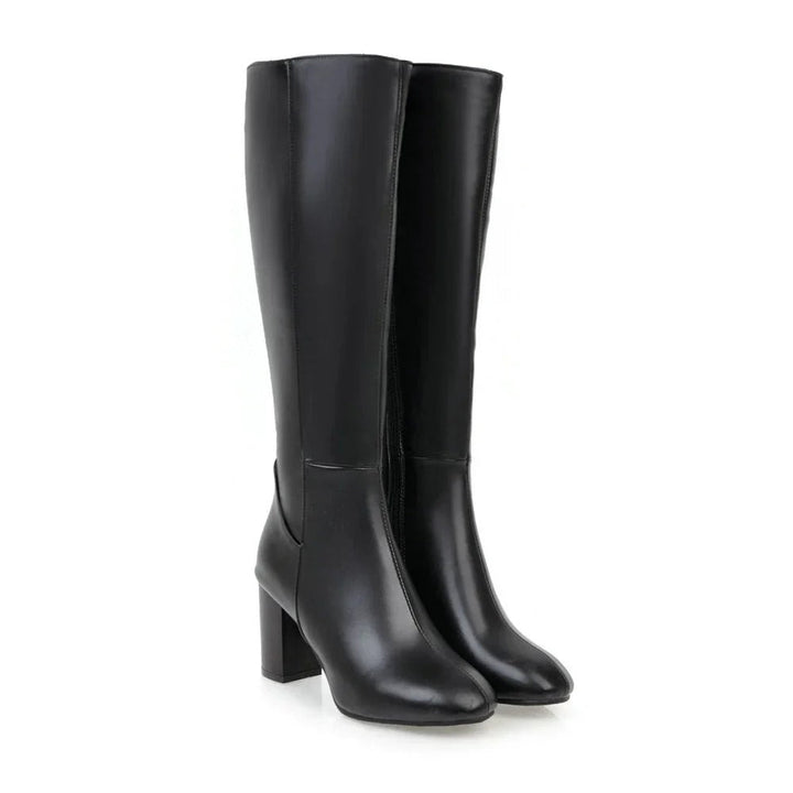 Klassische schwarze Damen Knielange Absatzstiefel, elegante Mode für Business oder Freizeit.