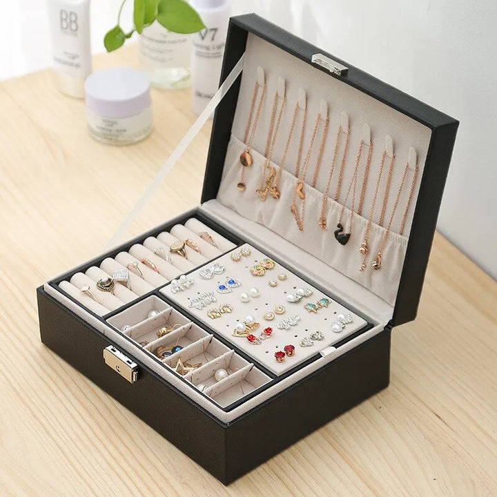 Hochwertige doppellagige Schmuckaufbewahrung aus PU-Leder für Damen, ideal zum Ordnen von Schmuck.