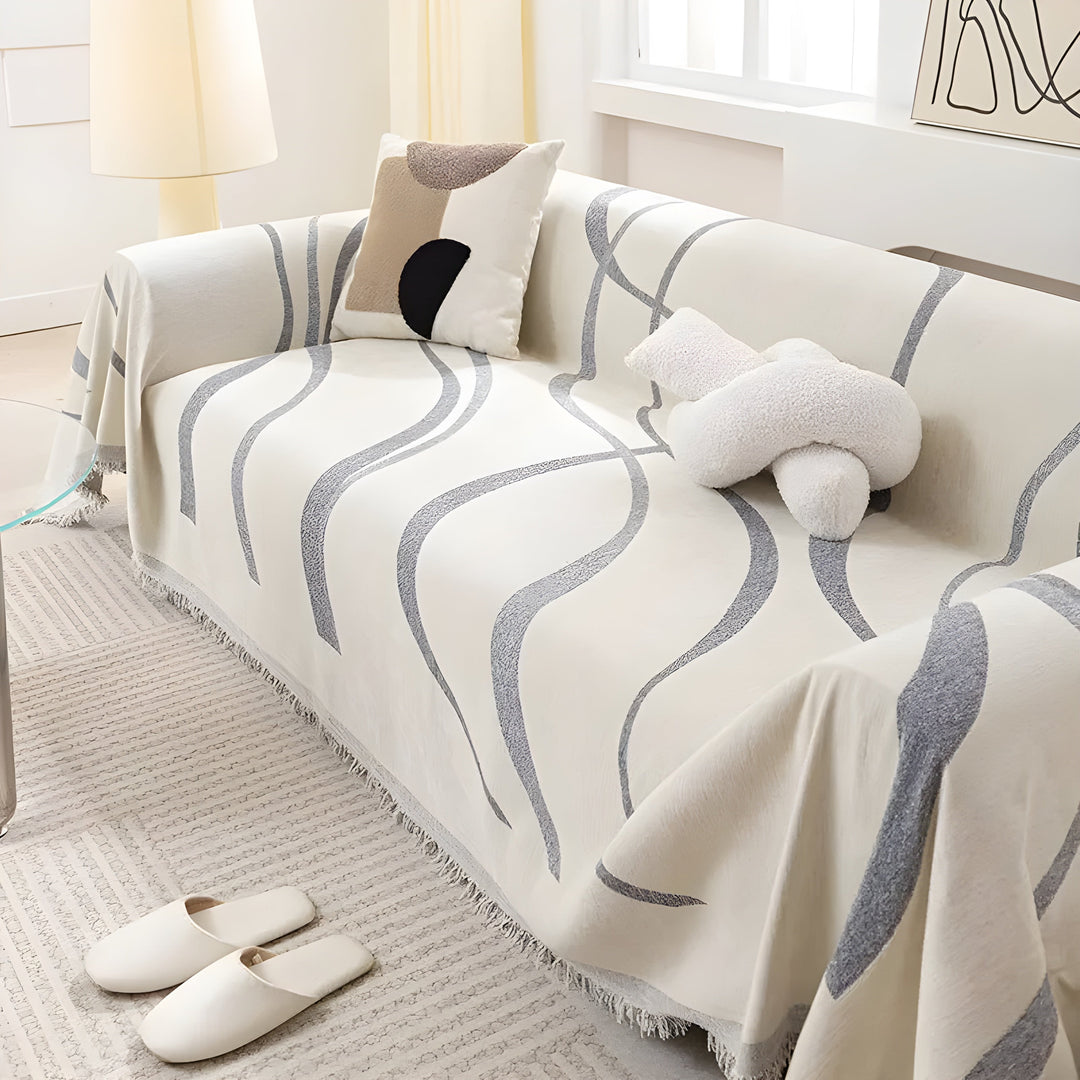 Luxuriöser umkehrbarer Chenille-Sofaüberwurf in Grau/Khaki für Stil & Schutz im Wohnzimmer.