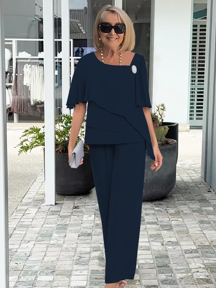 Festlicher Damen-Zweiteiler in Marineblau: ideales Outfit für Hochzeiten, Partys oder elegante Abende.