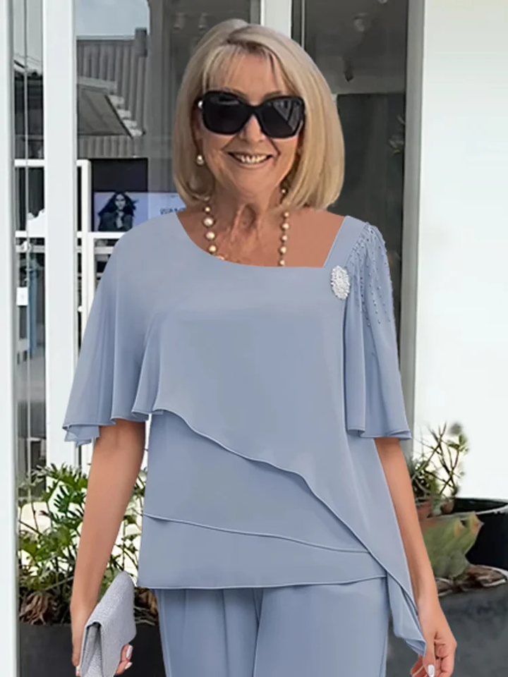 Komfortables, elegantes blaues Damen Set aus Hose und Bluse für stilvolle Auftritte bei festlichen Anlässen.