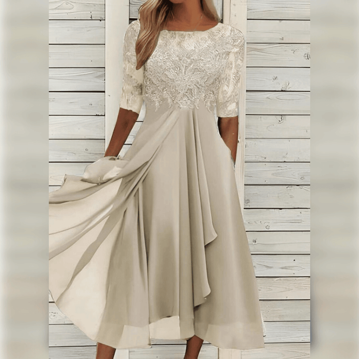 Elegantes Damen-Spitzenkleid mit 3/4-Arm, ideal als festliches Kleid oder für Hochzeitsgäste.