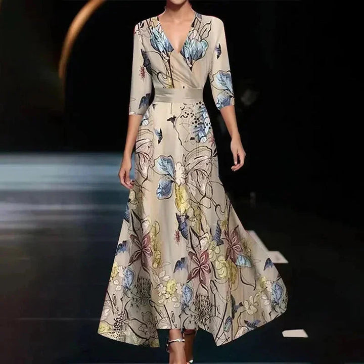 Fließendes Damen Maxikleid mit Blumenmuster, V-Ausschnitt. Komfortables und elegantes Sommerkleid für Freizeit & Urlaub.