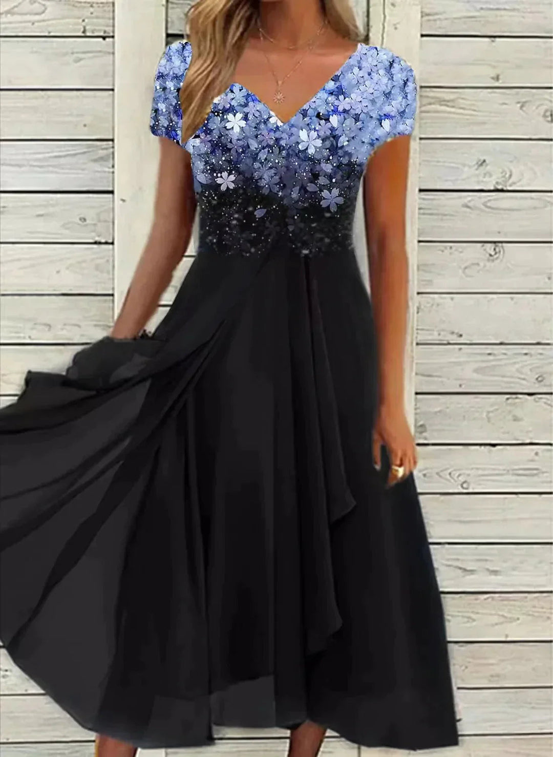 Damen Midi-Cocktailkleid mit floralem Oberteil und elegantem fließenden Rock. Ideal für festliche Anlässe.