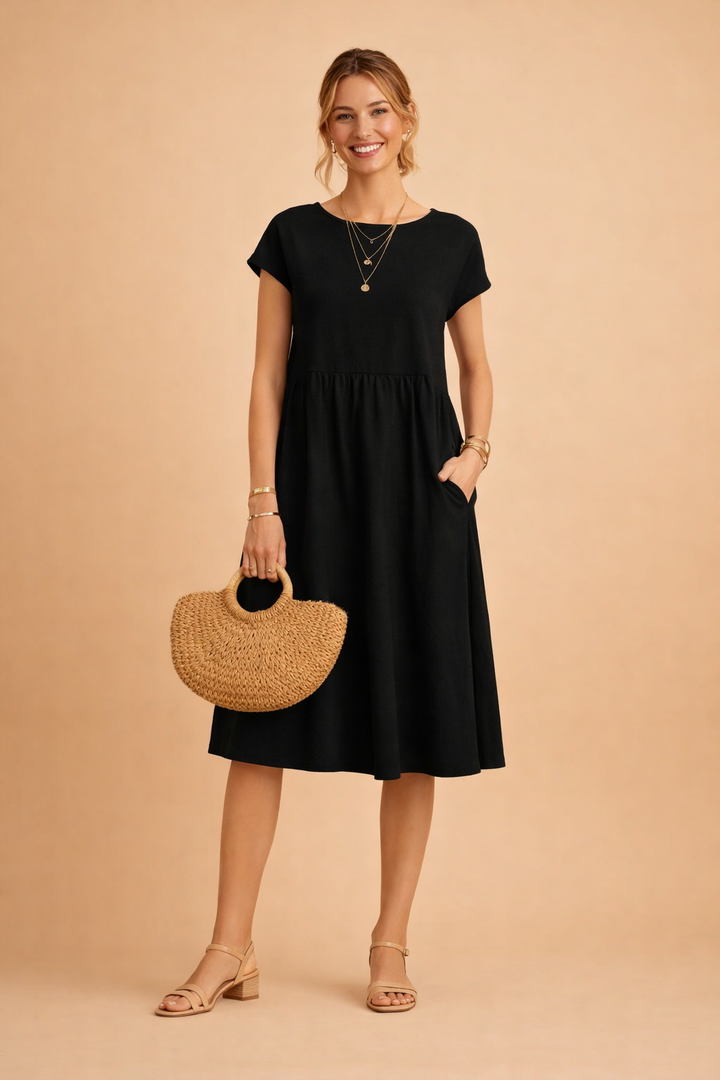 Luftiges Midi-Sommerkleid für Frauen, locker geschnitten, angenehm für warme Sommermode.