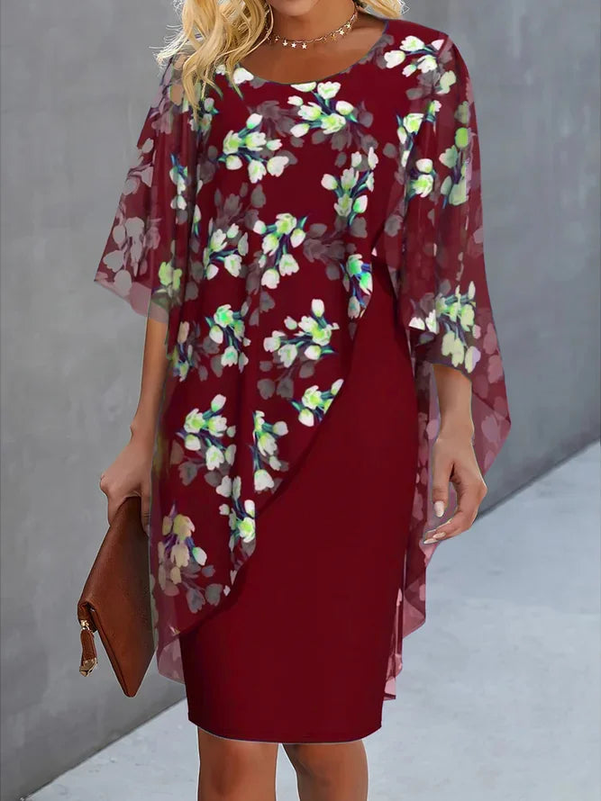 Fließendes Blumen Maxikleid für Damen mit stylischen Cape-Ärmeln, ideal als Abendkleid oder für Hochzeitsgäste.