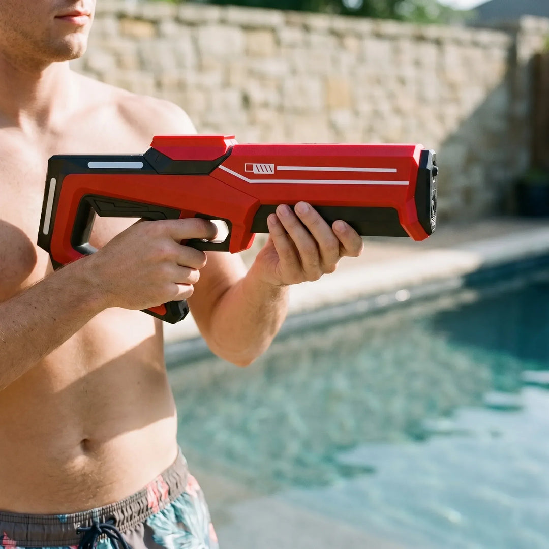 Elektrischer Wasserblaster für Kinder, mit automatischem Schuss für endlosen Wasserspaß im Garten.