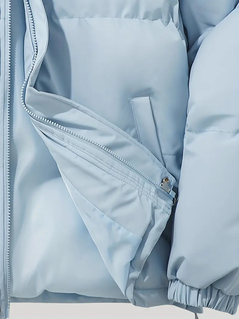 Dunkelgraue Damen Steppjacke, gefüttert, schützt zuverlässig vor Kälte.